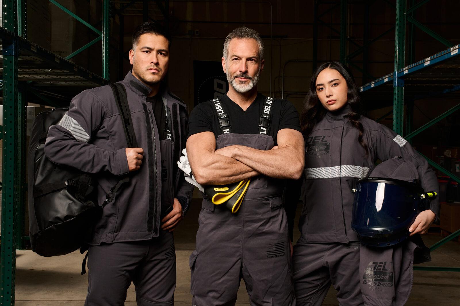 OEL team wearing arc flash protective apparel in a warehouse