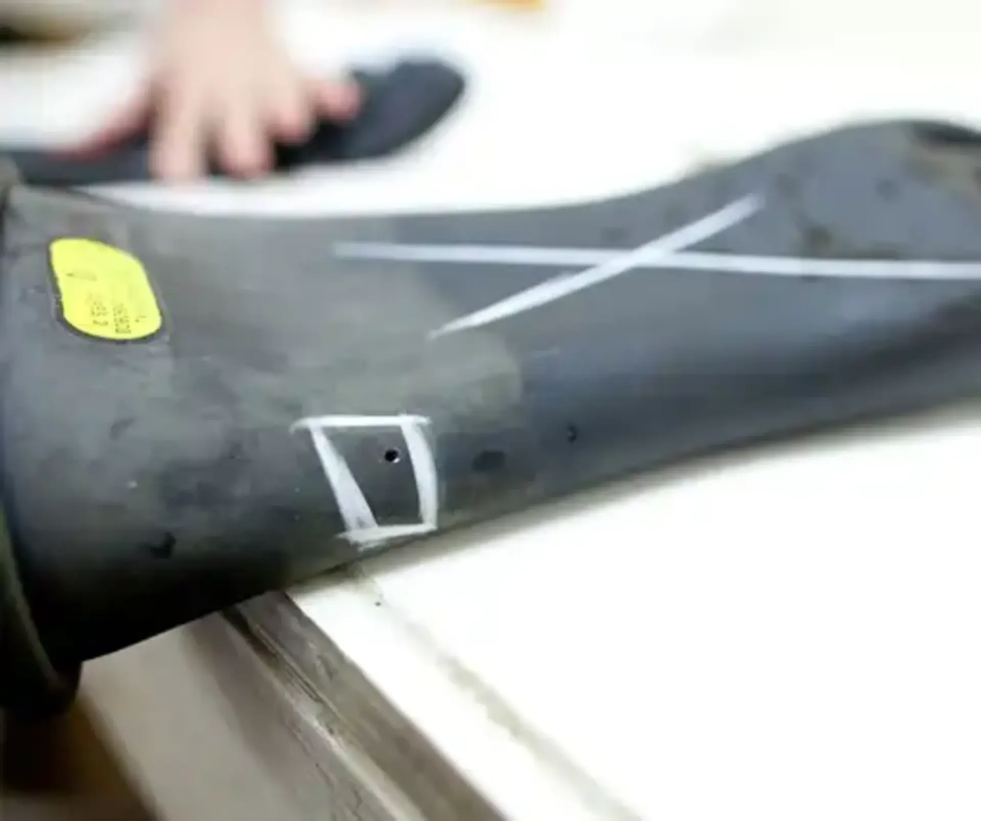 Failed rubber gloves defaced to prevent future field use